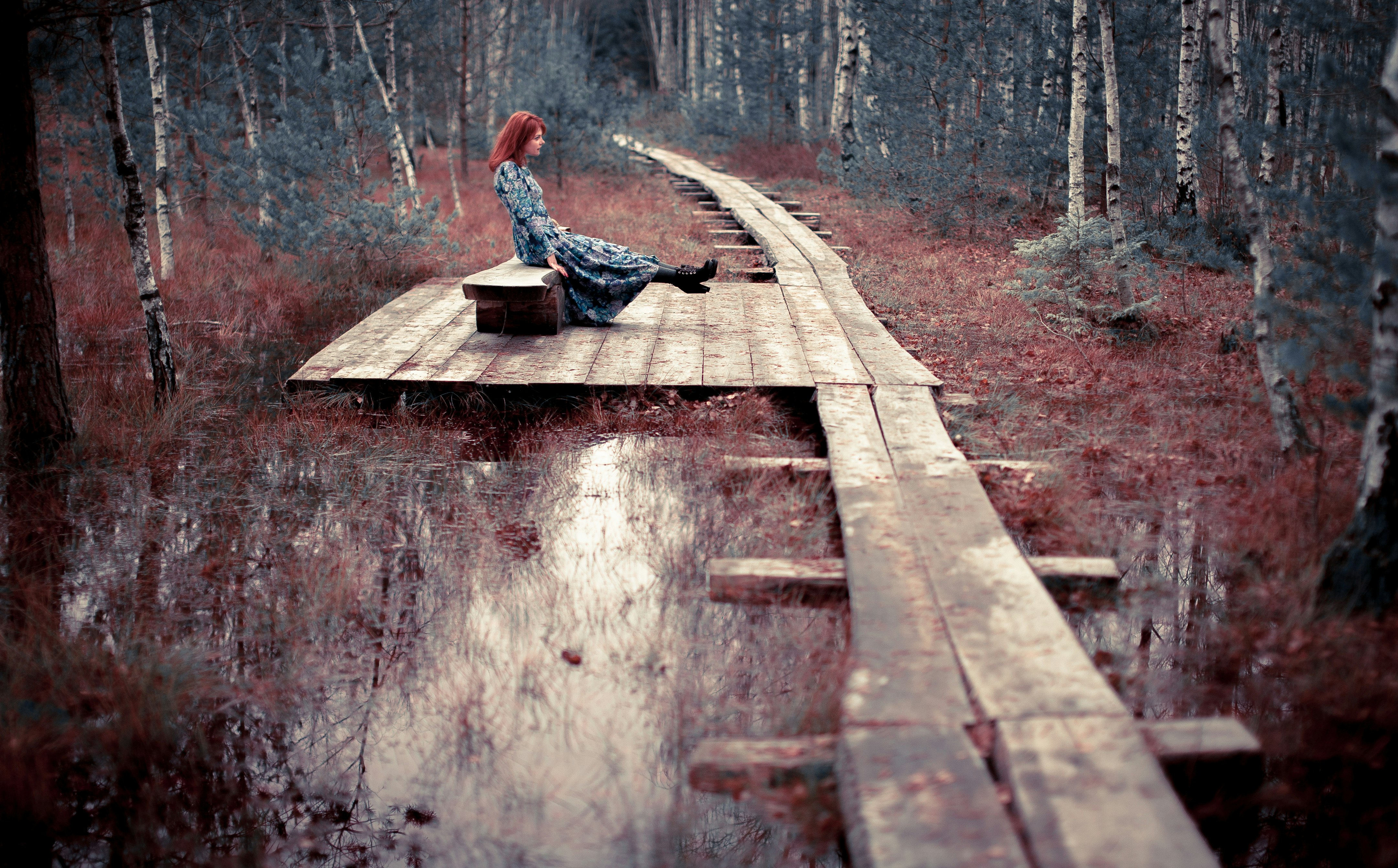 woman seating on bench